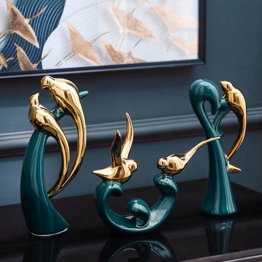 Gold birds family ornament