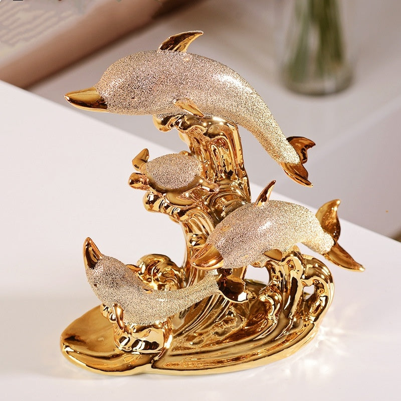 Gold dolphins ornament