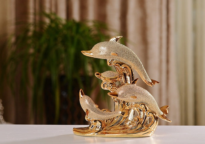 Gold dolphins ornament